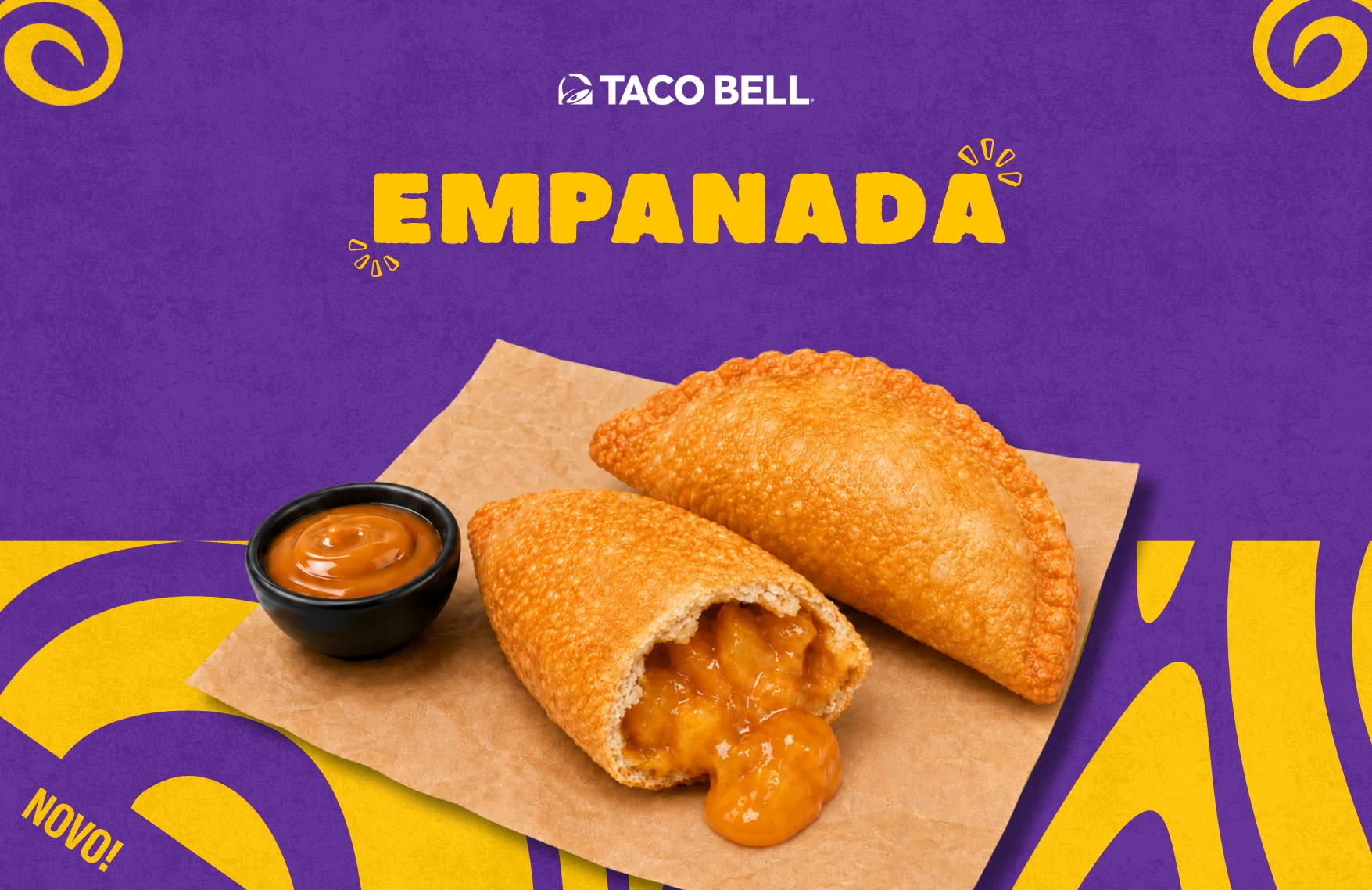 Mobilni Taco Bell baner za novu Empanadu – dvije pečene empanade sa slatkim umakom na ljubičastoj pozadini